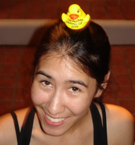 Khun Pak with a SPP Christmas Cup trophy on her head