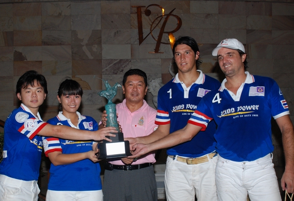 Thai Polo League Champions -- Captain Ploy receiving the trophy from her father Khun Bhinsaeng Kanoksakdi.