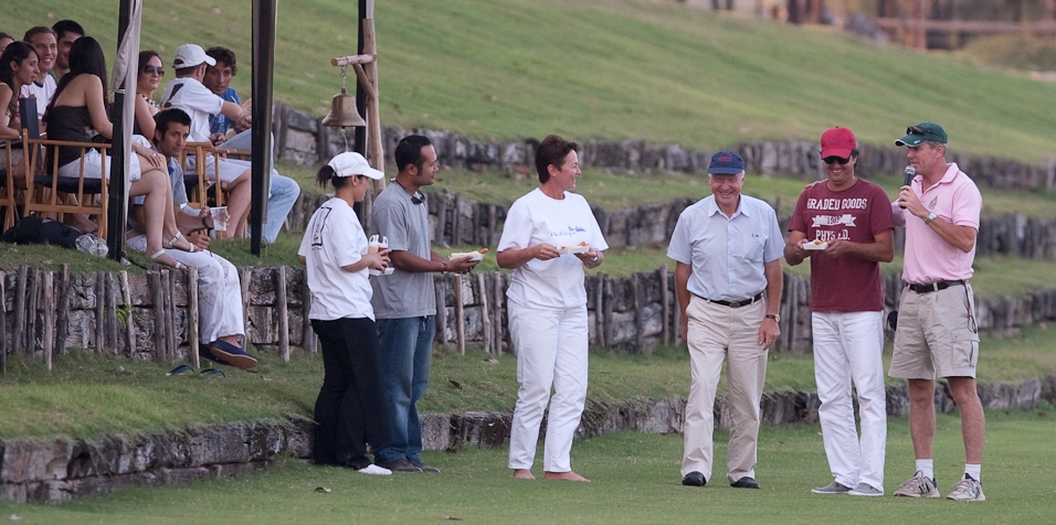 The Director of the League being presented a free Hot Dog by Khun Suzy at Polo Escape Saturday (Photographer Hugh was treated to a Hot Dog as well). 
